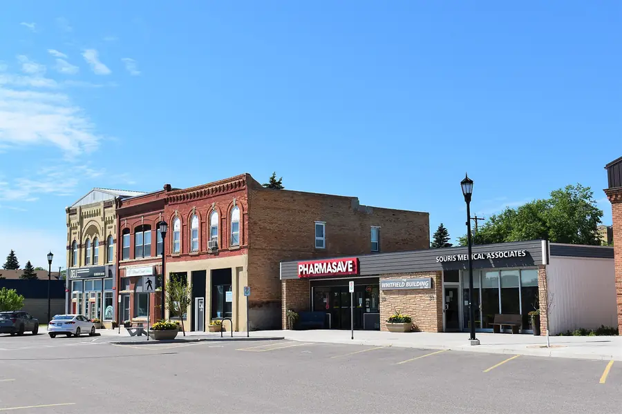 Small-town main street with brick storefronts in Souris, Manitoba